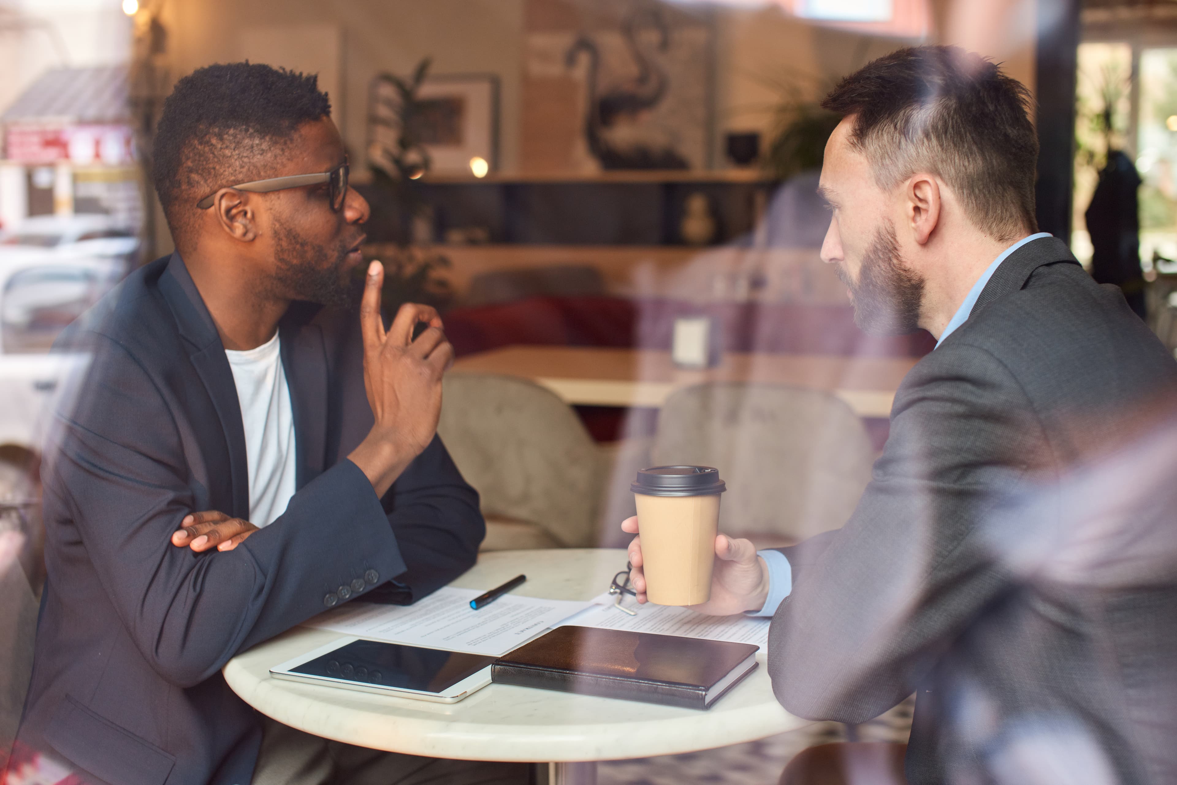 Professional meeting in coffee shop